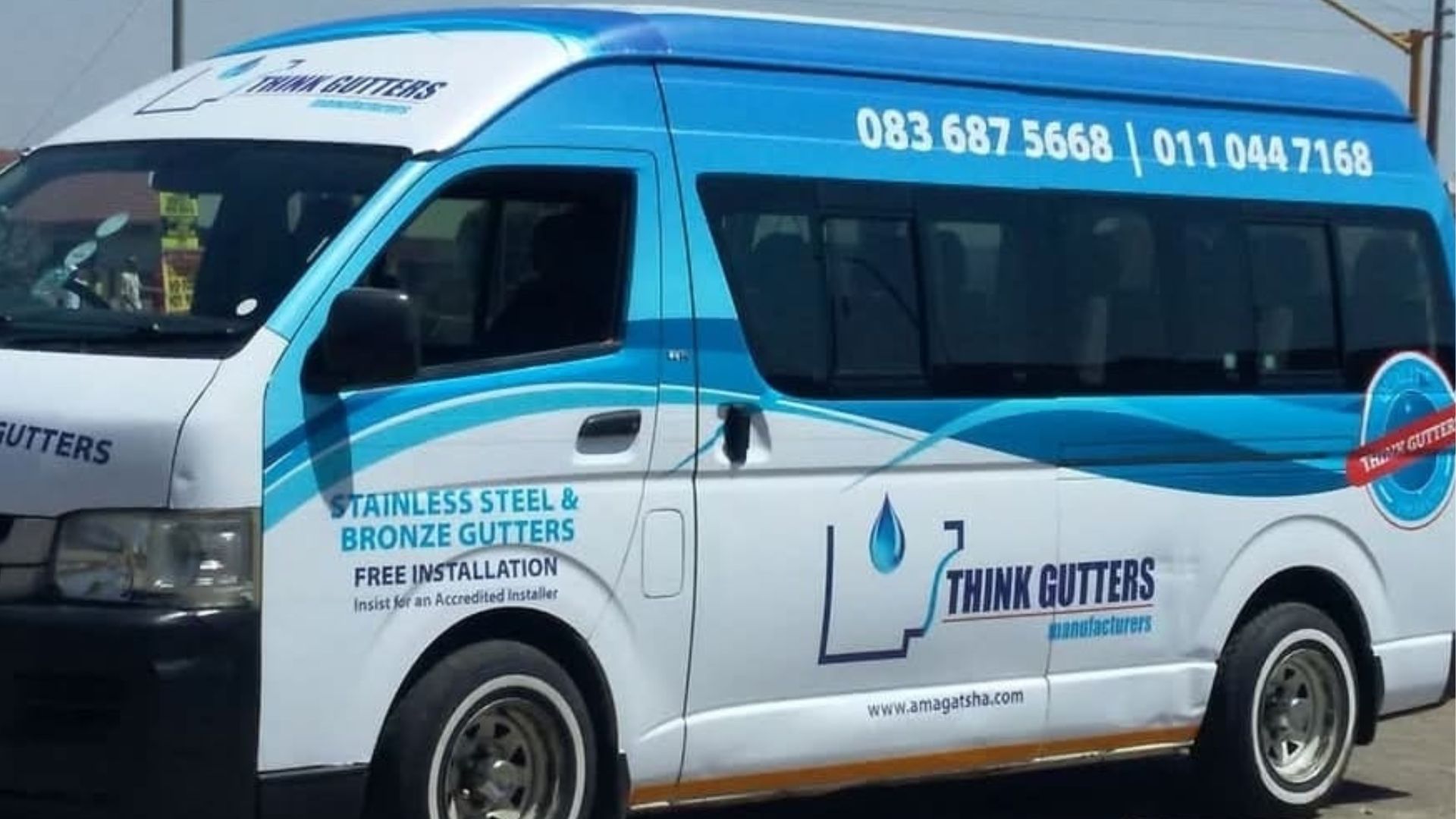 Think Gutters installation team at work